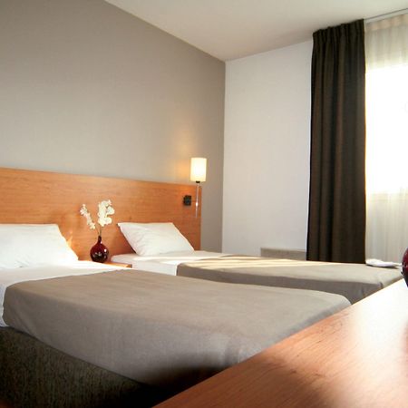 Sejours & Affaires Orleans Jeanne D'Arc Aparthotel Bagian luar foto
